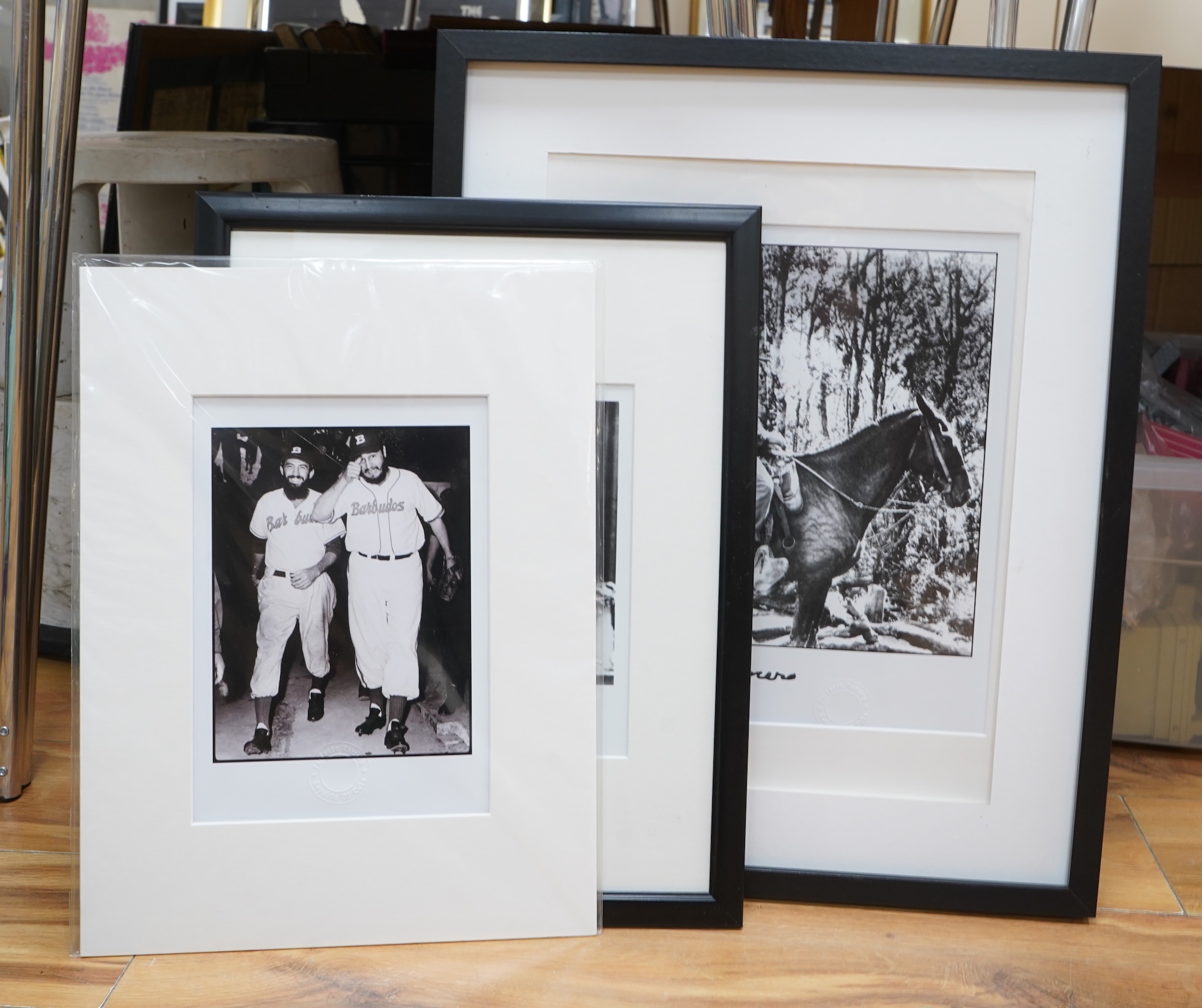 After Perfecto Romero (b.1936), three gelatin silver prints, Portraits of Che Guevara, stamped, two framed with facsimile signatures, largest 31 x 27cm
